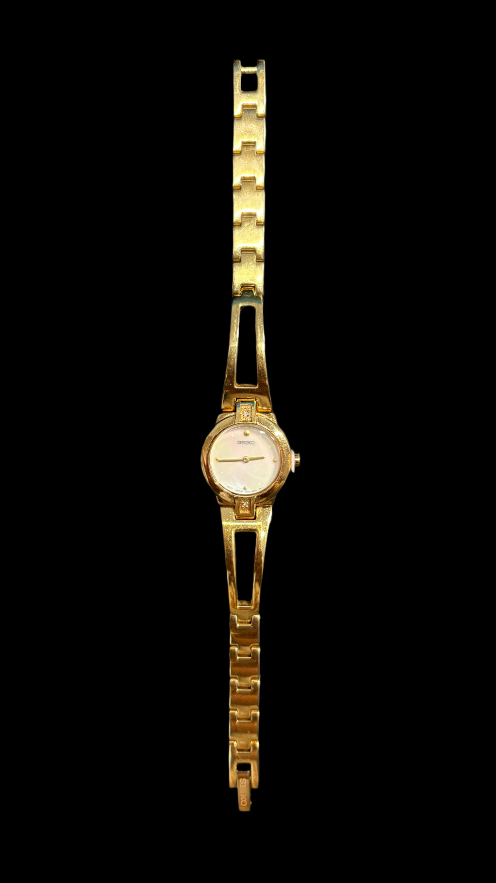 Montre cocktail Seiko en nacre et diamants