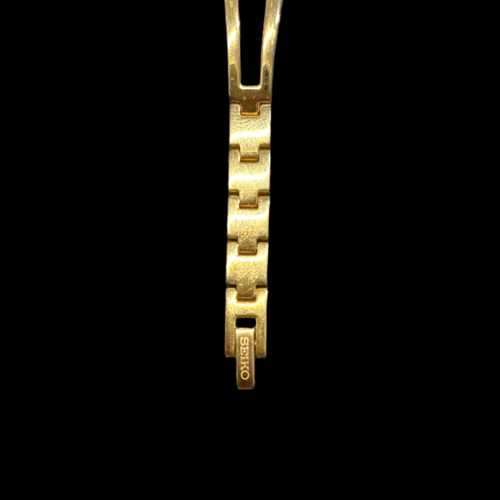 Montre cocktail Seiko en nacre et diamants
