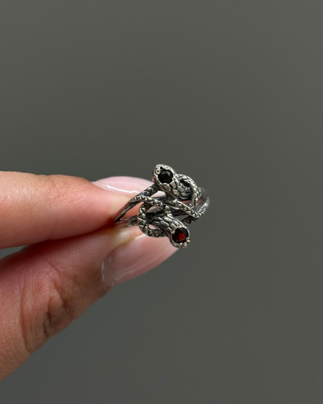 Sterling Knotted Double Headed Serpent with Garnet and Onyx Ring