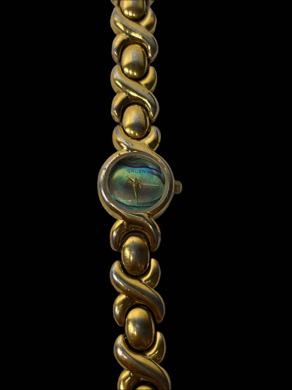 Montre Gruen en or à cadran abalone